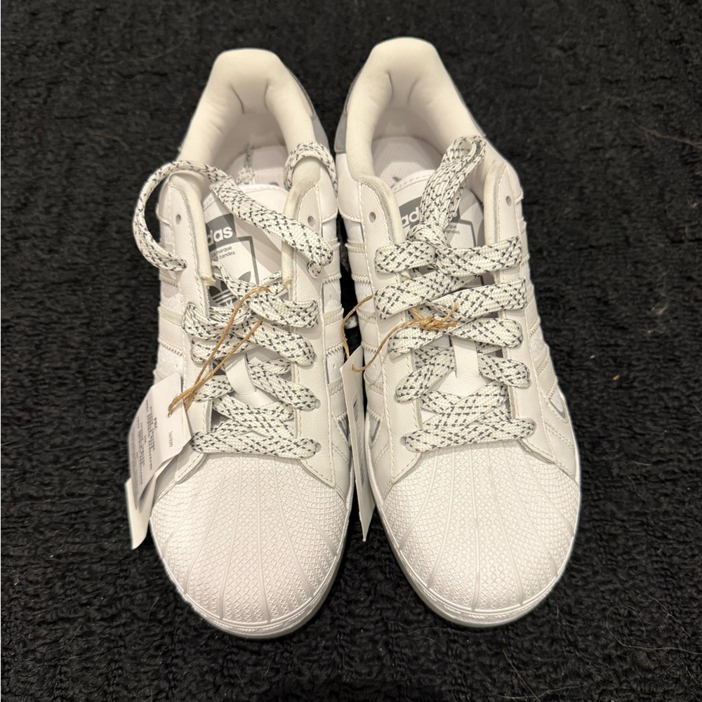 Women’s white superstars sneakers